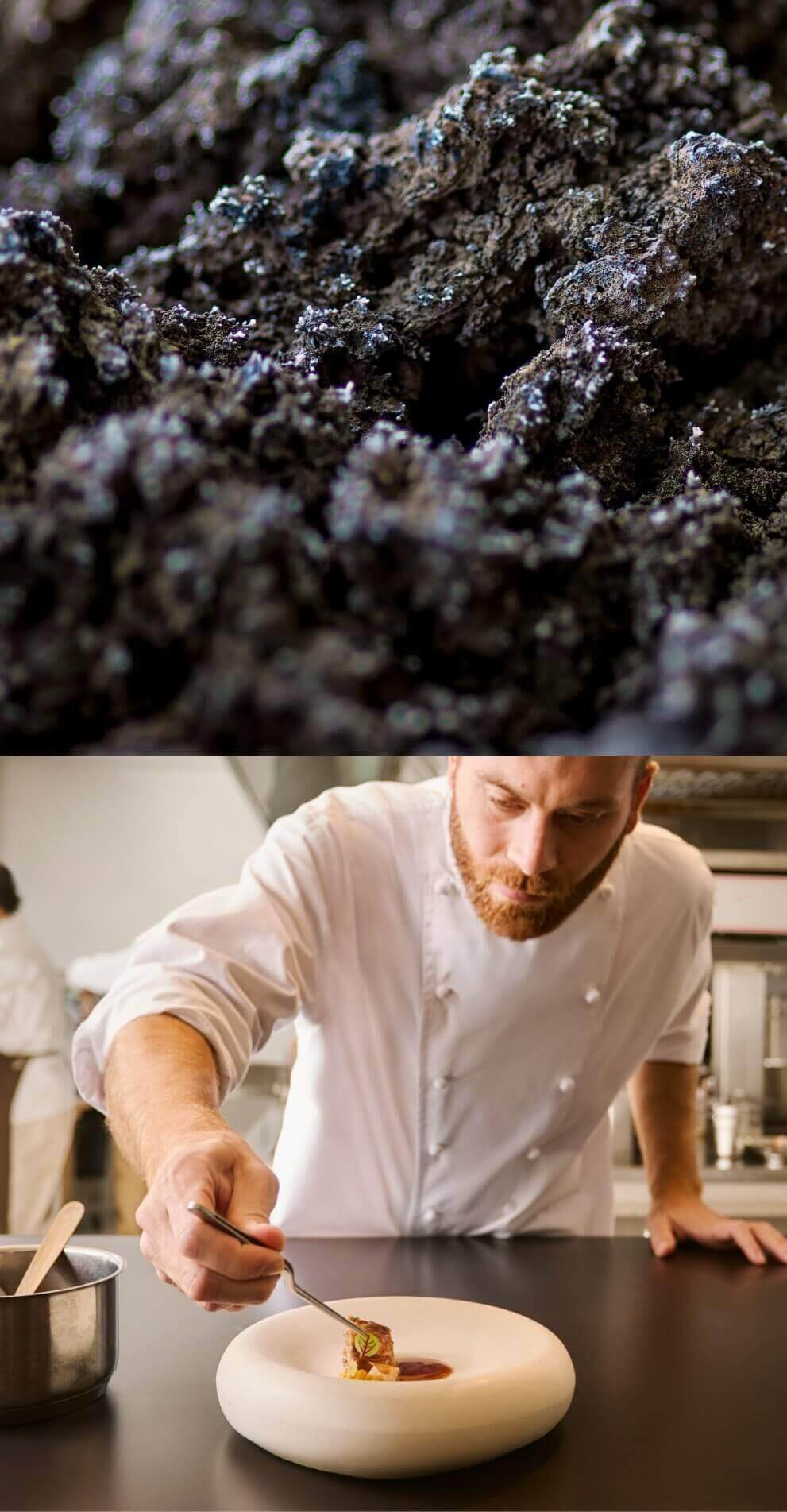 Chef en train de déposer un ingrédient sur un plat gastronomique dans une cuisine professionnelle, démontrant technique culinaire et dressage créatif.